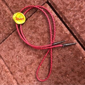 Squirt soda metal Bottle-cap Bolo Tie
Red cord metal tips unique gift